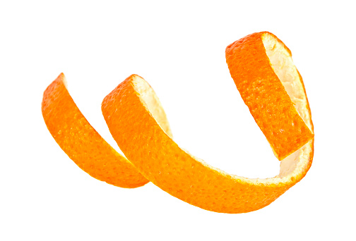 Single orange peel on a white background